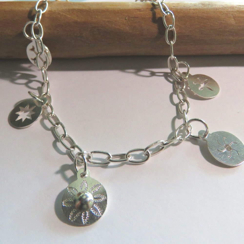 Sterling Silver Link Bracelet with 6 Pendants Txari Kuwü Kayu Pilpil - Image 2